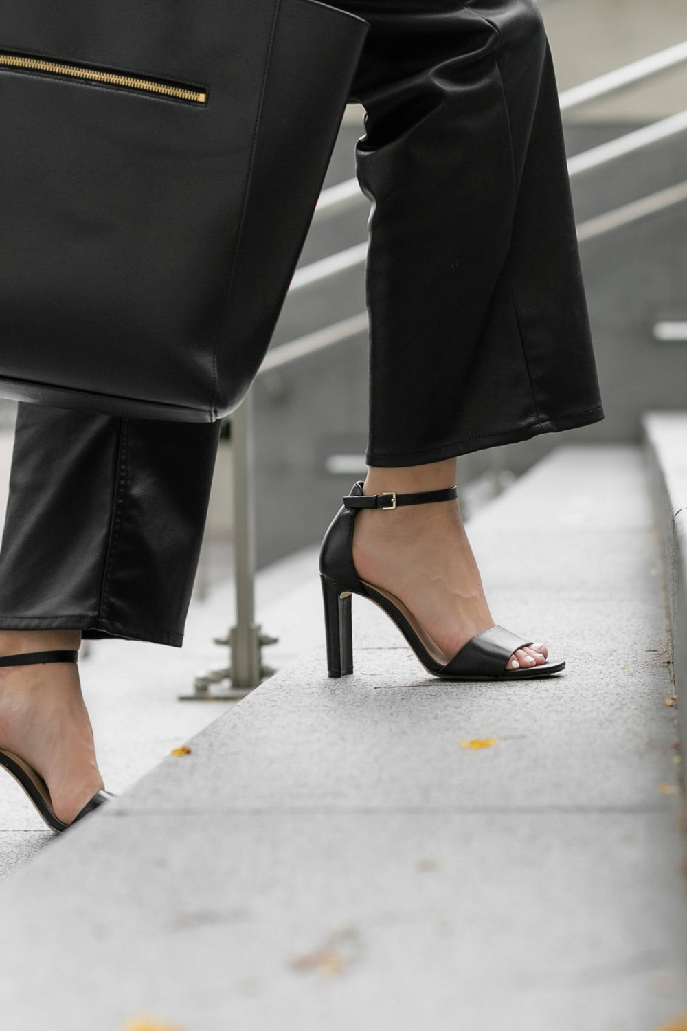 Angela Goodman walking up a set of steps