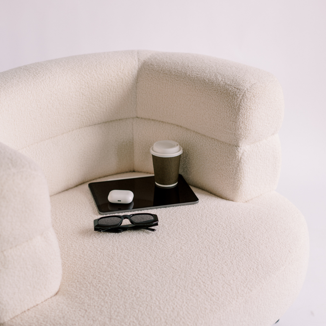 A quiet chair and side table set up for recording